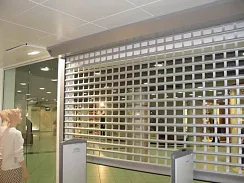 Витринные рольставни DoorHan решетчатые 3000х2800